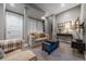 Comfortable living room features neutral walls, recessed lights, plush furniture, and access to the upper levels via carpeted stairs at 230 S Big Meadow Trl, Franktown, CO 80116