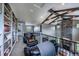 Comfortable upper level living area with fireplace and library at 230 S Big Meadow Trl, Franktown, CO 80116