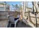 Backyard patio with four chairs and a fire pit, perfect for outdoor relaxation at 5425 W 115Th Pl, Westminster, CO 80020