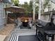 Backyard featuring fire pit, grill, and patio area at 5425 W 115Th Pl, Westminster, CO 80020