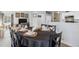 View of the dining room leading into the kitchen and living room at 5425 W 115Th Pl, Westminster, CO 80020