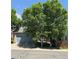 Charming blue home with a mature shade tree in a well-kept neighborhood at 5425 W 115Th Pl, Westminster, CO 80020