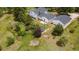 Aerial view of the home and surrounding yard with established landscaping at 723 Brussels Dr, Parker, CO 80138