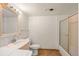 Clean bathroom featuring large vanity, a shower and tub combo at 723 Brussels Dr, Parker, CO 80138