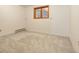 Clean bedroom with natural light, wall mounted heating and neutral carpet at 723 Brussels Dr, Parker, CO 80138