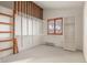 Well-organized room with shelving, neutral carpet, and a bright window at 723 Brussels Dr, Parker, CO 80138