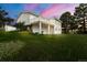 Exterior shot of home with deck, showcasing the home's architectural style and backyard at 723 Brussels Dr, Parker, CO 80138