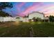 Charming split-level home with a well-maintained lawn and inviting front entrance at 723 Brussels Dr, Parker, CO 80138