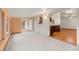 Open living room with natural light and a sliding glass door that leads to the deck at 723 Brussels Dr, Parker, CO 80138