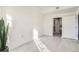 Bright bedroom with walk-in closet, white plank flooring, and light-colored walls at 300 W 11Th Ave # 4F, Denver, CO 80204