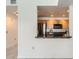 Kitchen view from living room, stainless steel appliances and granite countertops offer a modern touch at 300 W 11Th Ave # 4F, Denver, CO 80204