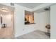 Bright living room featuring stylish flooring and a pass-through to the kitchen at 300 W 11Th Ave # 4F, Denver, CO 80204