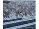 Winter view from roof featuring snow-covered trees, a picturesque vista of the building's scenic surroundings at 300 W 11Th Ave # 4F, Denver, CO 80204