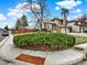 Exterior view of a two-story home with landscaped yard, corner lot, and an attached garage at 3973 S Joplin Way, Aurora, CO 80013