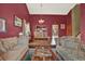 Living room showcasing plush sofas, area rug, and access to dining area at 3973 S Joplin Way, Aurora, CO 80013