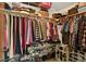 Organized walk-in closet with ample shelving and hanging space for clothing and accessories at 3973 S Joplin Way, Aurora, CO 80013