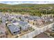 An aerial shot showcasing this neighborhood's serene mountain setting surrounded by beautiful forest at 45 Bridge St, Breckenridge, CO 80424