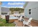 Backyard featuring a hot tub and outdoor seating, ideal for relaxation at 45 Bridge St, Breckenridge, CO 80424