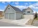 View of this home's spacious detached two-car garage and additional fenced parking area at 45 Bridge St, Breckenridge, CO 80424