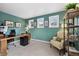 Comfortable home office featuring soft natural light and built-in shelving at 45 Bridge St, Breckenridge, CO 80424
