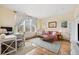 Bright living room with hardwood floors, large windows, and stylish furnishings for a cozy atmosphere at 45 Bridge St, Breckenridge, CO 80424