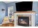 Inviting living room showcasing a fireplace, comfortable seating, and a cozy atmosphere for relaxation at 45 Bridge St, Breckenridge, CO 80424