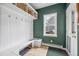 Mud room with plenty of storage, hooks, and built-in dog bowls at 45 Bridge St, Breckenridge, CO 80424