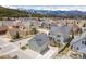 An aerial view of a mountain neighborhood and beautiful home exteriors in a scenic, desirable location at 45 Bridge St, Breckenridge, CO 80424