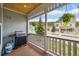 Front porch with a grill, hanging plants, and beautiful neighborhood views at 45 Bridge St, Breckenridge, CO 80424