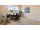 Bright home office with natural light, neutral walls, and views of the surrounding neighborhood at 14284 W 88Th Dr # B, Arvada, CO 80005