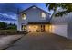 Charming entryway features a double door and cozy seating, perfect for welcoming guests in style at 8370 Midsummer Ln, Elizabeth, CO 80107