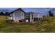 Small outbuilding structure with grass all around on a large lot at 8370 Midsummer Ln, Elizabeth, CO 80107