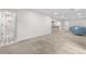 Finished basement with a wet bar, bathroom, and comfortable seating area at 2320 S Valley Hwy, Denver, CO 80222