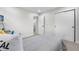 Bright bedroom features closet, and connecting door to hallway at 2320 S Valley Hwy, Denver, CO 80222