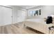 This bedroom features beautiful natural light from bay window and spacious closets at 2320 S Valley Hwy, Denver, CO 80222