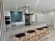 Bright kitchen with an expansive island, stainless steel appliances, and contemporary finishes at 2320 S Valley Hwy, Denver, CO 80222