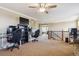 Open bonus room on upper floor has a loft feeling with several computers, perfect for many activities at 42350 Forest Oaks Dr, Elizabeth, CO 80107