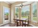 Cozy breakfast nook with natural light, hardwood floors, and a view of the outdoors at 42350 Forest Oaks Dr, Elizabeth, CO 80107