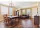 Inviting living room with hardwood floors, ample natural light, and stylish decor at 42350 Forest Oaks Dr, Elizabeth, CO 80107