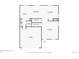First floor plan featuring kitchen, living room, garage, and bathroom spaces with approximate room dimensions for visualization at 676 Hedgerow Way, Brighton, CO 80601
