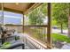 Relaxing front porch featuring comfortable seating, perfect for enjoying the neighborhood view at 676 Hedgerow Way, Brighton, CO 80601