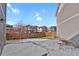Fenced backyard with a concrete patio at 26167 E Byers Pl, Aurora, CO 80018