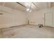 Spacious two-car garage featuring an automatic door opener and ample room for storage and parking at 26167 E Byers Pl, Aurora, CO 80018