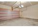 Spacious two car garage with pink door and room for storage at 26167 E Byers Pl, Aurora, CO 80018