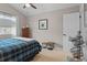 Well-lit bedroom with neutral walls, plush carpet, ceiling fan and natural light at 17297 Opal Hill Dr, Parker, CO 80134