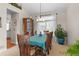 Inviting dining room with ample seating, natural light, and stylish decor elements at 17297 Opal Hill Dr, Parker, CO 80134