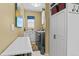 Functional laundry room with ample storage, modern appliances, and practical design elements at 17297 Opal Hill Dr, Parker, CO 80134