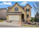 Charming two-story home with a two car garage, with tasteful landscaping enhancing the curb appeal at 2562 S Kendrick St, Denver, CO 80228