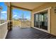 Covered patio with wood-look decking and an open view at 2562 S Kendrick St, Denver, CO 80228