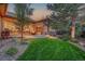 Outdoor space with a fire pit and seating, perfect for enjoying the backyard at 2571 Hunters Pl, Highlands Ranch, CO 80129